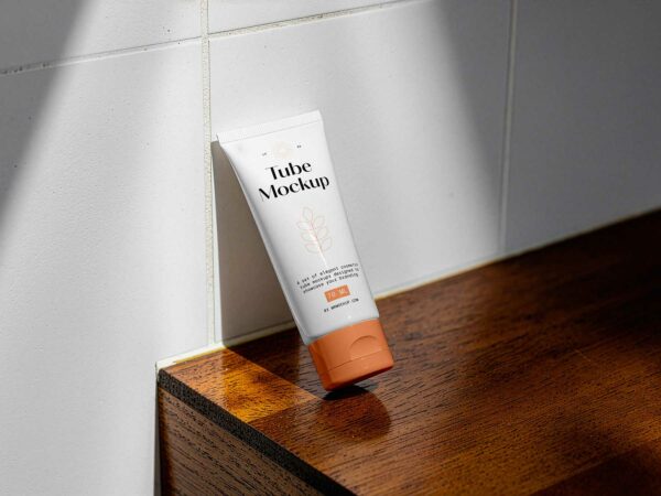 Free Cosmetic Tube Mockup on Wooden Counter