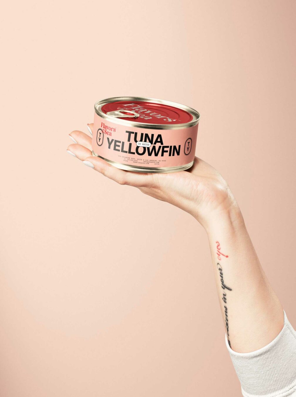 Free Food Can Mockup Held by Hand