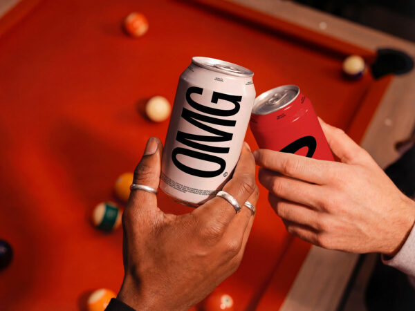 Free Soda Cans Cheers Mockup Held in Hands